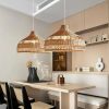 Radiant Rattan Pendant Lights Over Island Cafe