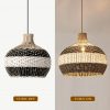 Black-White-Rattan-Pendant-Light-On-Off-Comparison