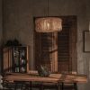 Capsule Rattan Pendant Light Over Dining Table