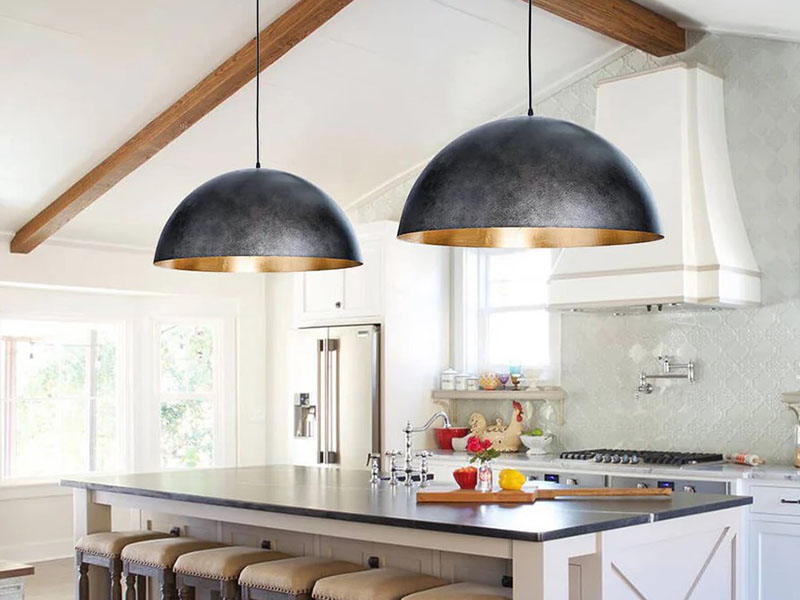 Two Metal Dome Pendants Over Kitchen Island