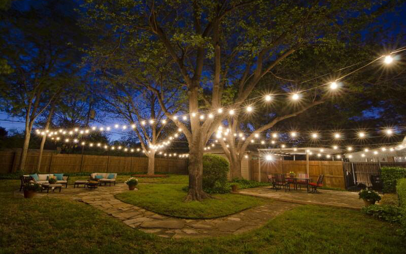 Cozy String Lights Add A Warm, Inviting Glow To The Backyard