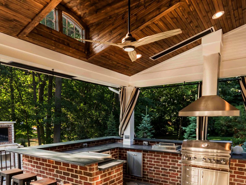 Integrated Ceiling Fans With Lights Under A Covered Outdoor Bar