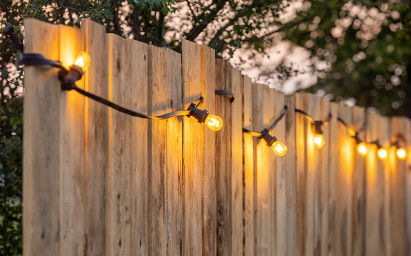 Light Up Front Yard Fence With String Light