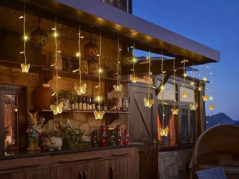 Magical Butterfly String Lights Add A Warm Glow To This Outdoor Bar Retreat
