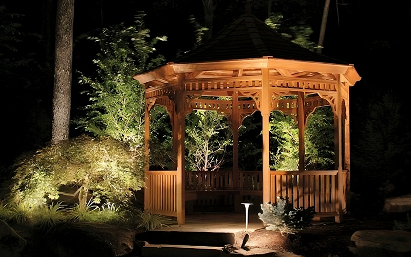 Illuminated Wooden Gazebo Stands Out With Spotlights