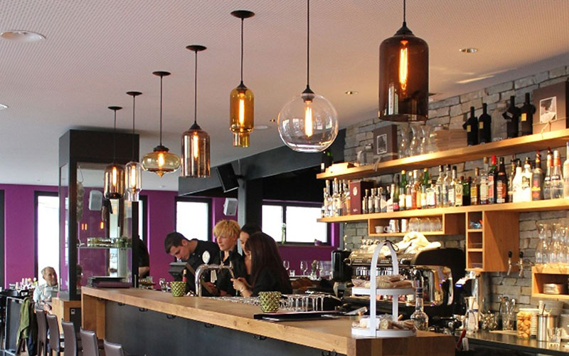 Illuminate Your Bar With Glass And Metal Pendant Fixtures