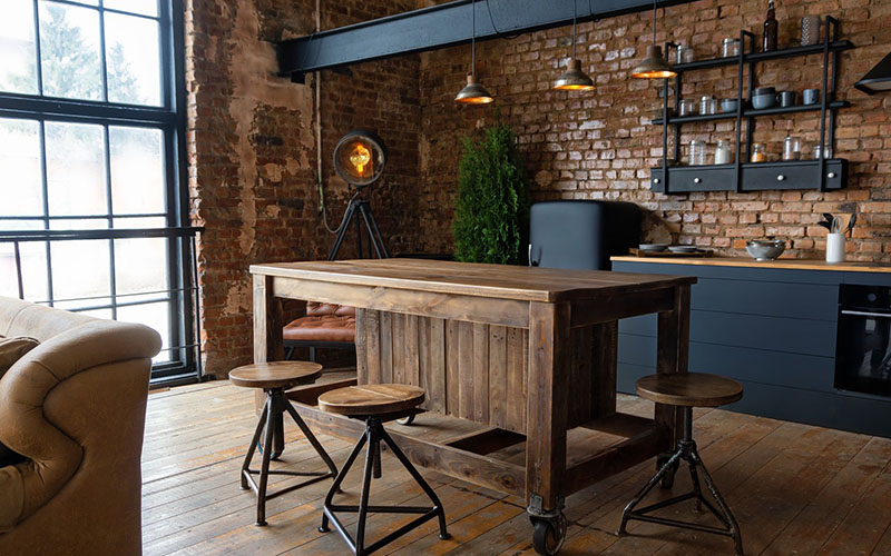Industrial Kitchen And Dining Space With Rustic Wood And Exposed Brick