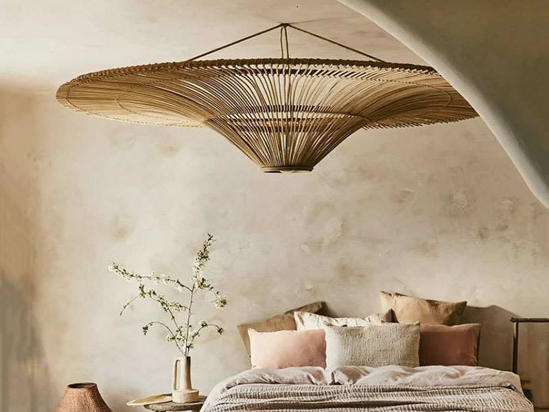 Oversized Rattan Pendant Above The Bed