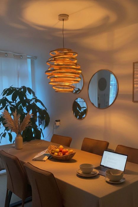 Artistic Dining Room Spiral Rattan Pendant Light Moody Warm Interior