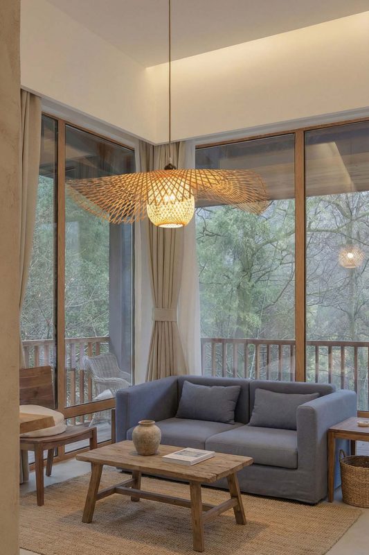 Cozy Living Room Wide Woven Rattan Pendant Light Window View Interior