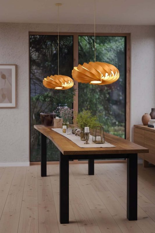 Modern Dining Room Double Sculptural Wooden Pendant Lights Over Long Table Natural Window View