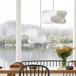 Silk Cocoon Pendant Light above dining table by window