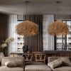 Wabi Sabi Rattan Pendant Lamp Hanging Over boho Living Room