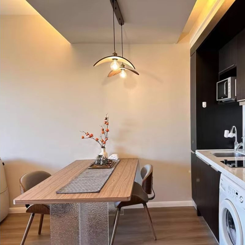 Wabi Sabi Wing Wood Pendant Light Over Kitchen Dining Table