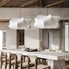 White Silk Cocoon Pendant Lights over dining table