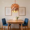Wooden Pinecone Pendant Light Fixture Over Dining Table