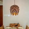 Wooden Pinecone Pendant Light Over Dining Table