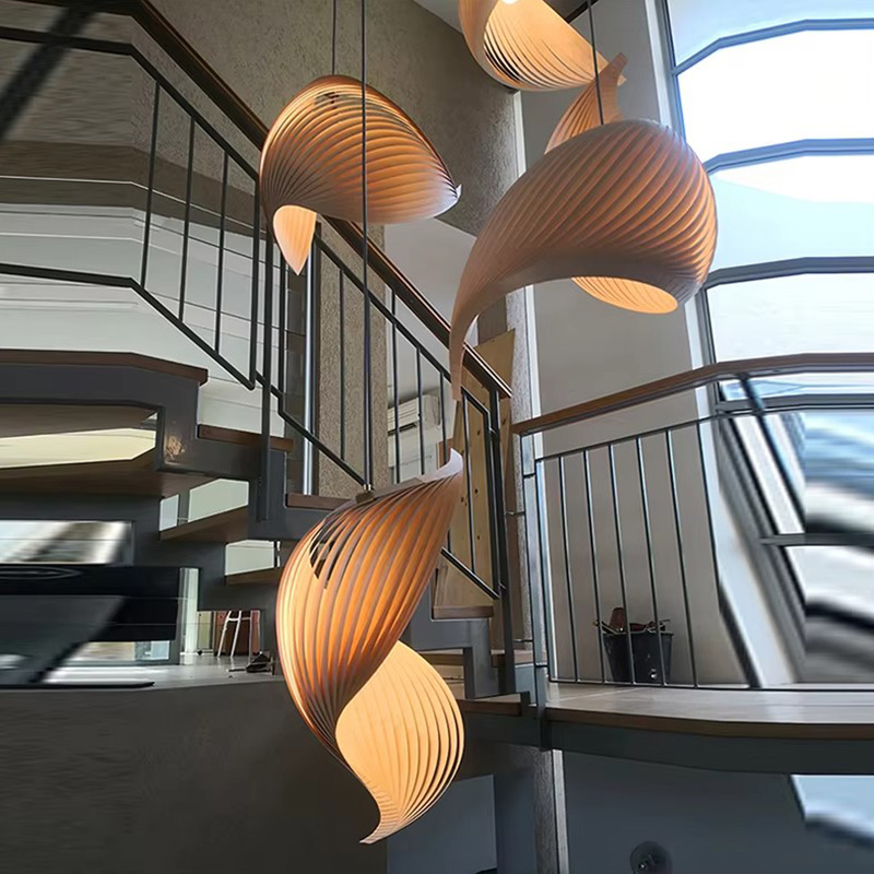 Cascading Wood Shell Shape Wooden Chandeliers in Open Stairwell