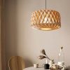 Large Geometric Wood Drum Pendant Light in Natural Finish Over Cozy Dining Table