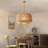Natural Geometric Wood Drum Pendant Light in Scandinavian Dining Room